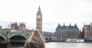 young woman looking over Big Ben whilst on her UK Gap Year