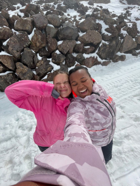 two participants enjoying New Zealand's snowy mountains