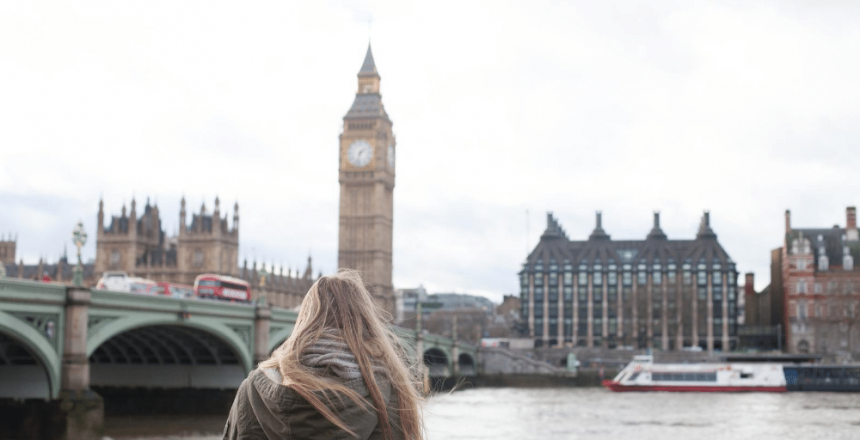young woman looking over Big Ben whilst on her UK Gap Year